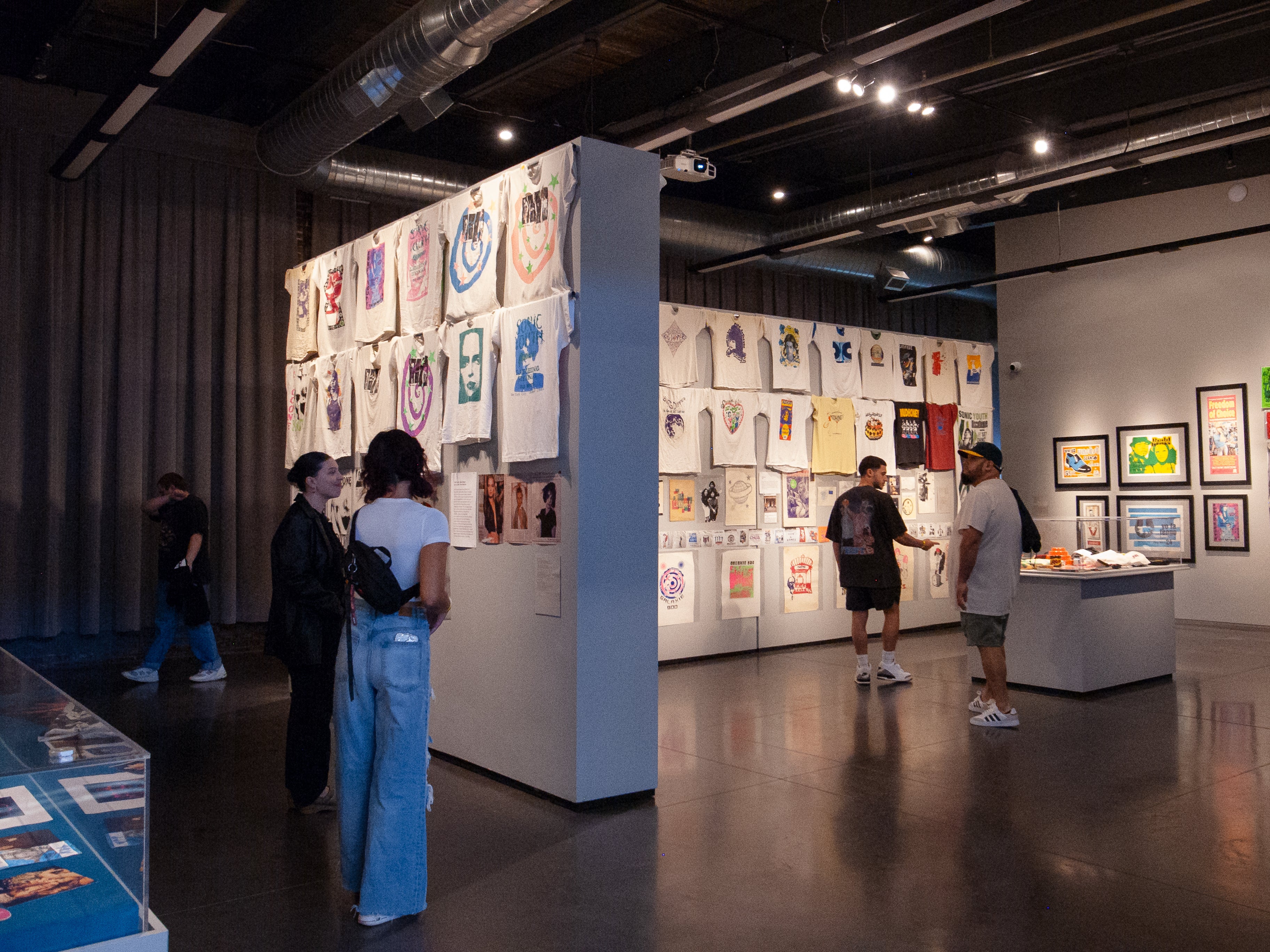 People browsing and viewing the gallery at the WaterFire Arts Center